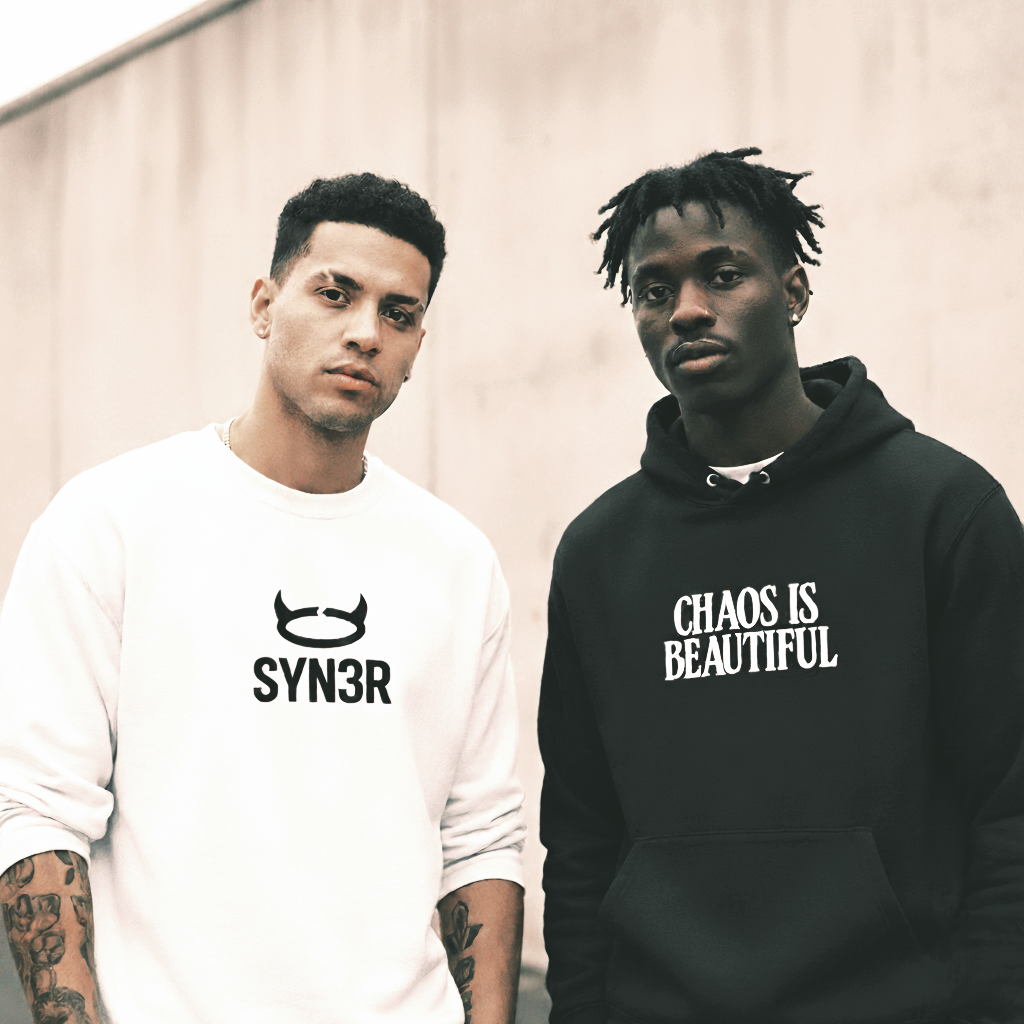 Men wearing SYN3R® graphic hoodies in black and white